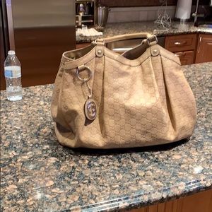 Gucci monogram leather satchel